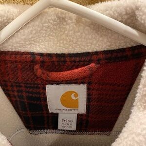 Woman Carhart jacket.  Barely used.  Warm. Red plaid.